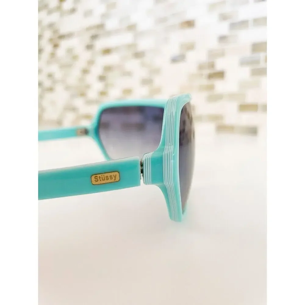 Stussy Mint Green Shield Sunglasses with Gradient Smoke Lenses